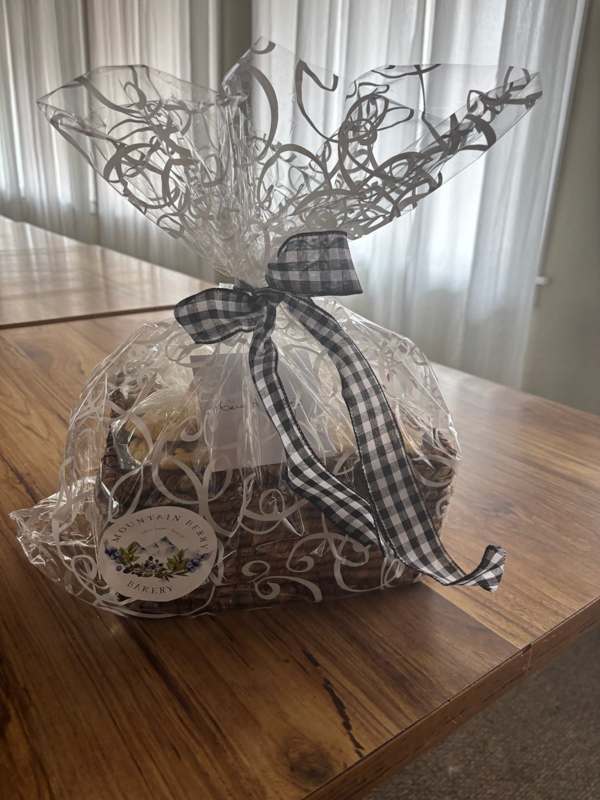 Mountain Berry Bakery gift basket wrapped with ribbon